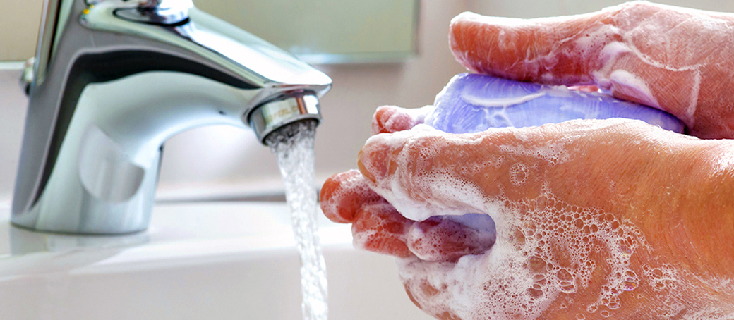Soapy hands to prevent flu causing bacteria